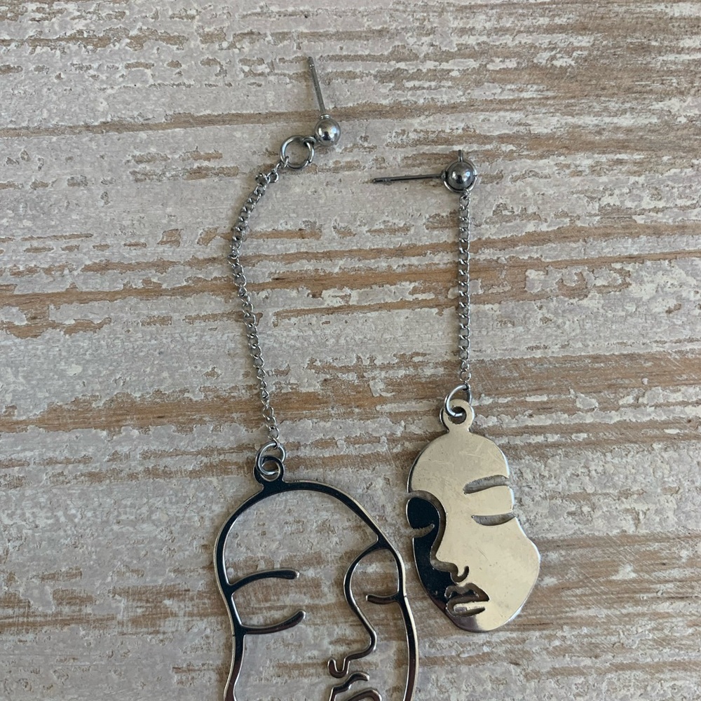 Silver Face Outline Dangle Earrings